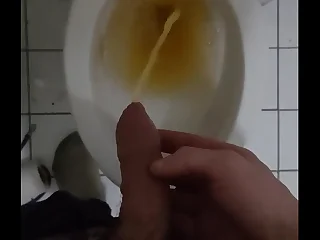 Twink pissing in toilet