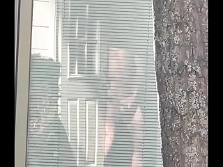 Watching my neighbor masturbate